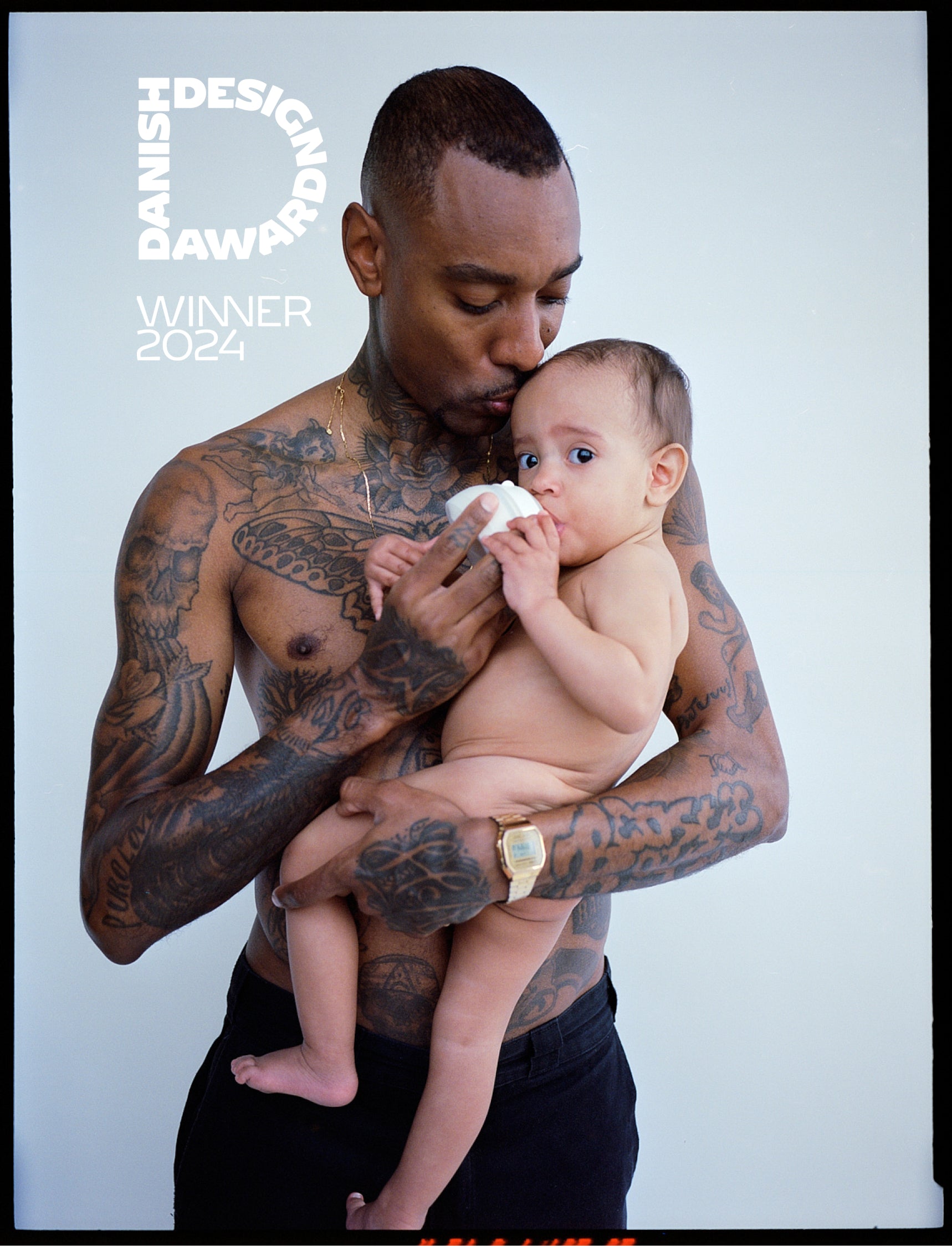 Dad on parental leave, paternity, feeding baby with Danish Design award winning bottle for closeness