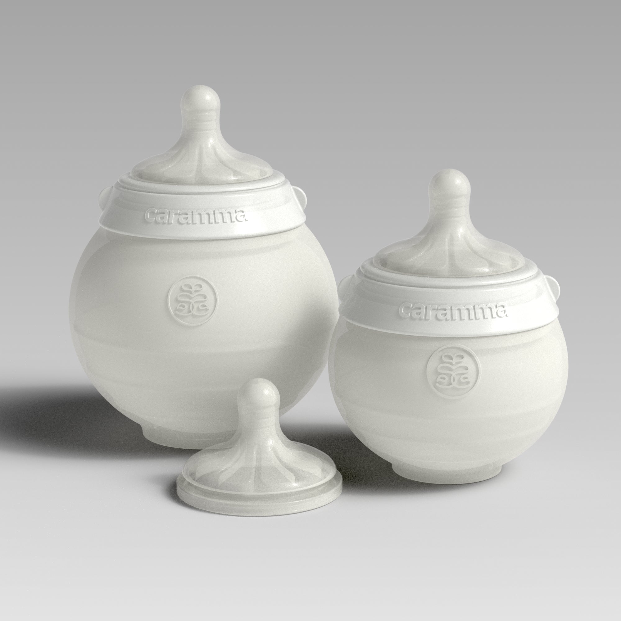 The Caramma Support Kit includes small and large ergonomic bottles and an extra nipple — ideal for newborn to toddler feeding.