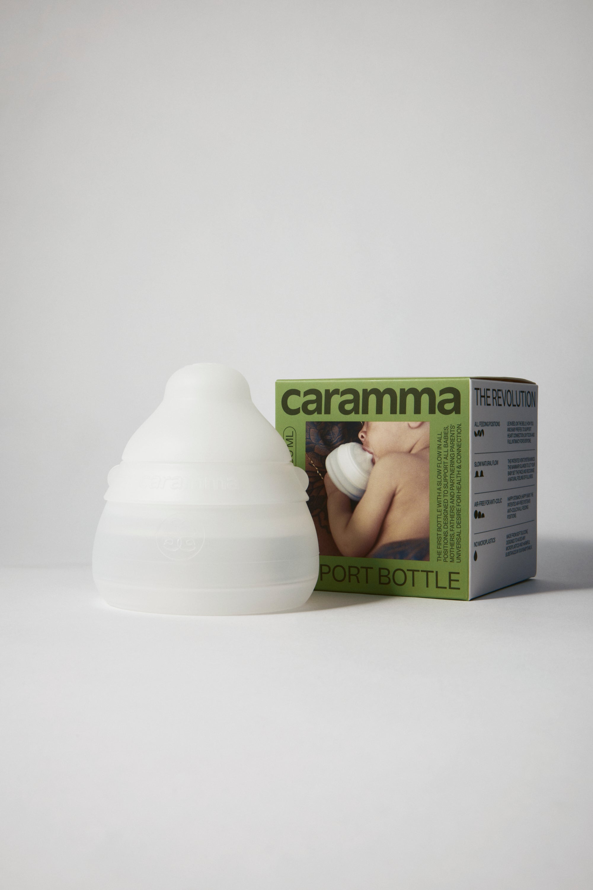 caramma small Support Bottle with packaging featuring green brand color and design for baby bottle
