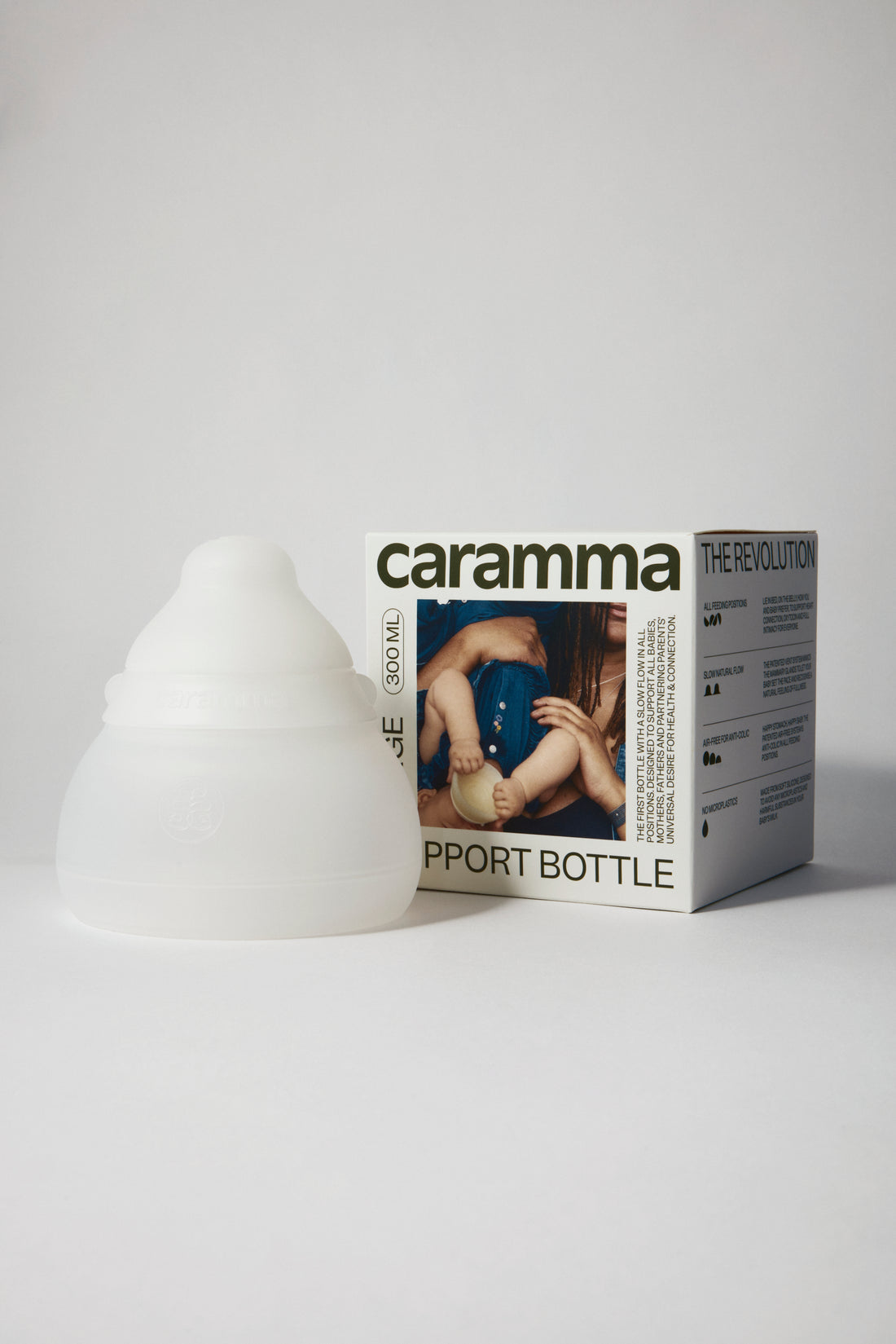 caramma large Support Bottle with packaging featuring distinct caramma brand identity for modern parents