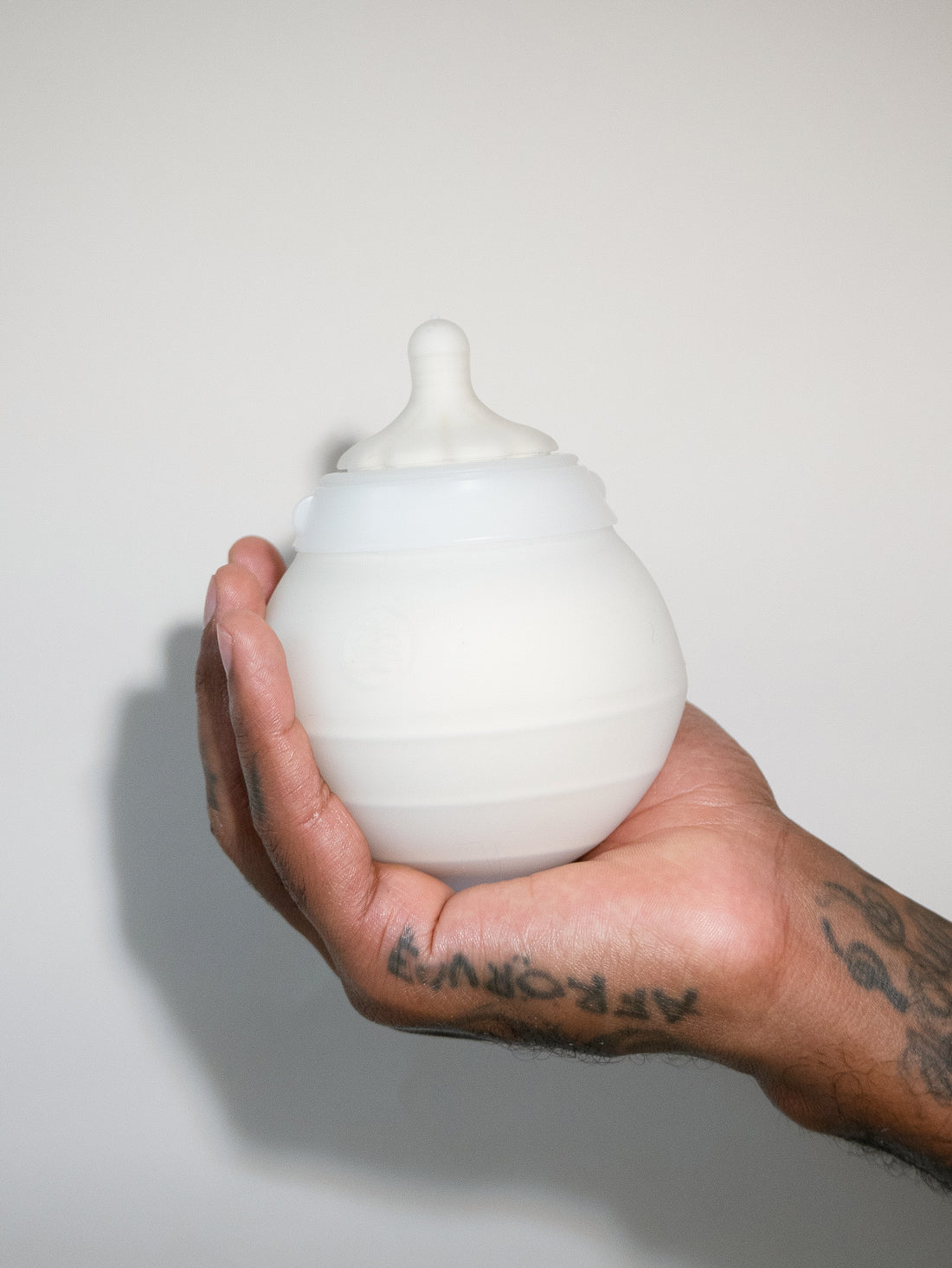 Caramma large 300ml breast-like baby bottle with anti-colic and natural-flow valve system for older infants.